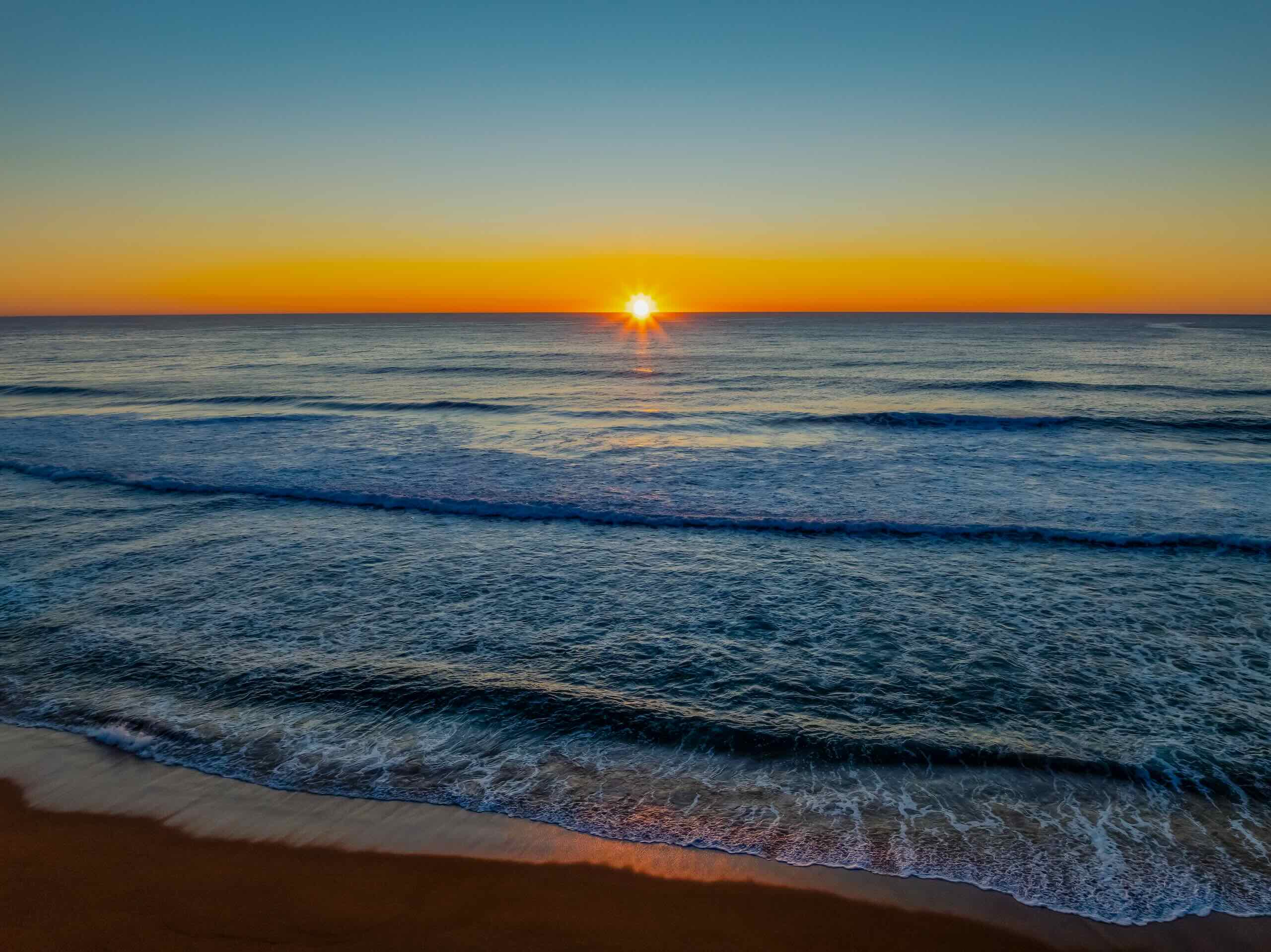 Aerial,Sunrise,Seascape,From,Whale,Beach,On,The,Northern,Beaches